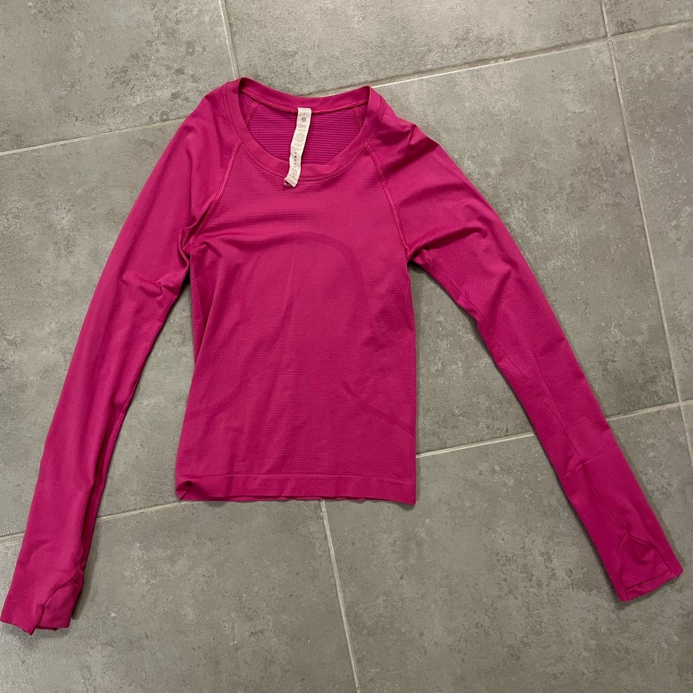 Lululemon sonic pink long sleeve swiftly shirt. Race length. Size 0.